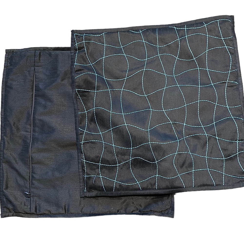Two 18 x 18 brown with blue design pillow covers